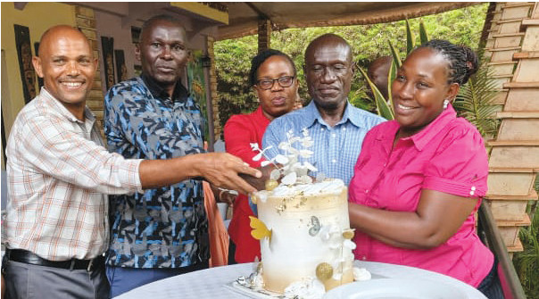Mr. Joseph Byaruhanga and colleagues